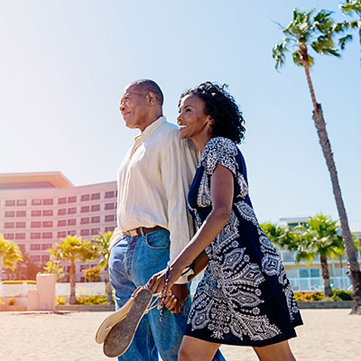 Couple walking on the beach